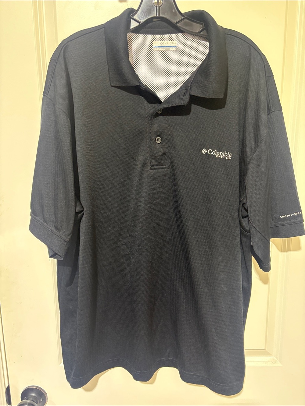 Columbia Men’s Black Polo Shirt with Small White Logo